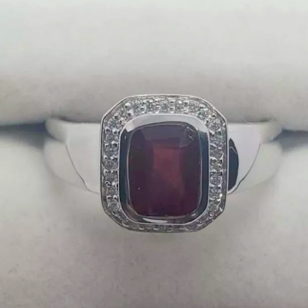 Sterling silver size 7.5 ring with a 8mm x 6mm garnet